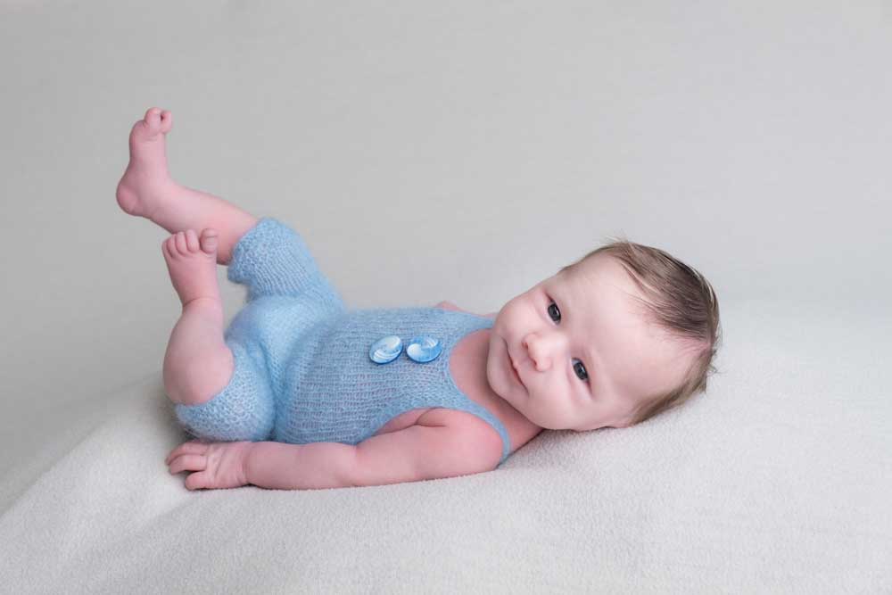 Happy Little Baby in Warm Clothes, Poses for the Camera Stock Photo - Image  of adorable, selfconfident: 29220422