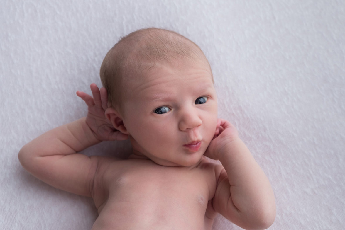 Light and Feminine Newborn Photos | Adorable Newborn Poses